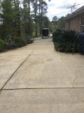 After a completed residential pressure washing company project in the area